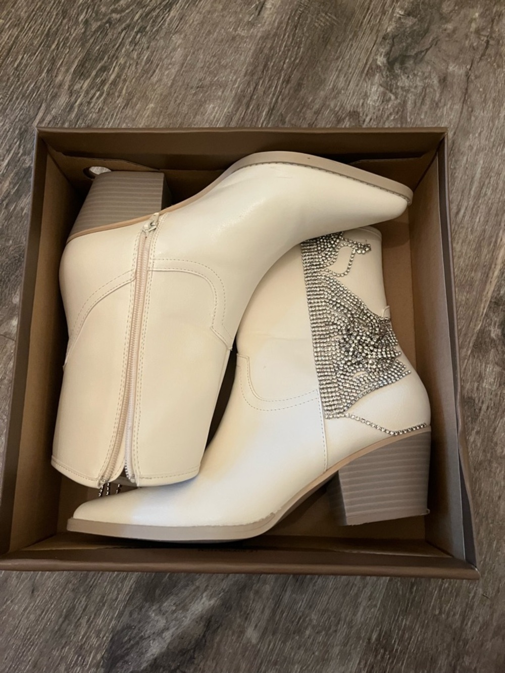 White ankle boots with rhinestone fringe